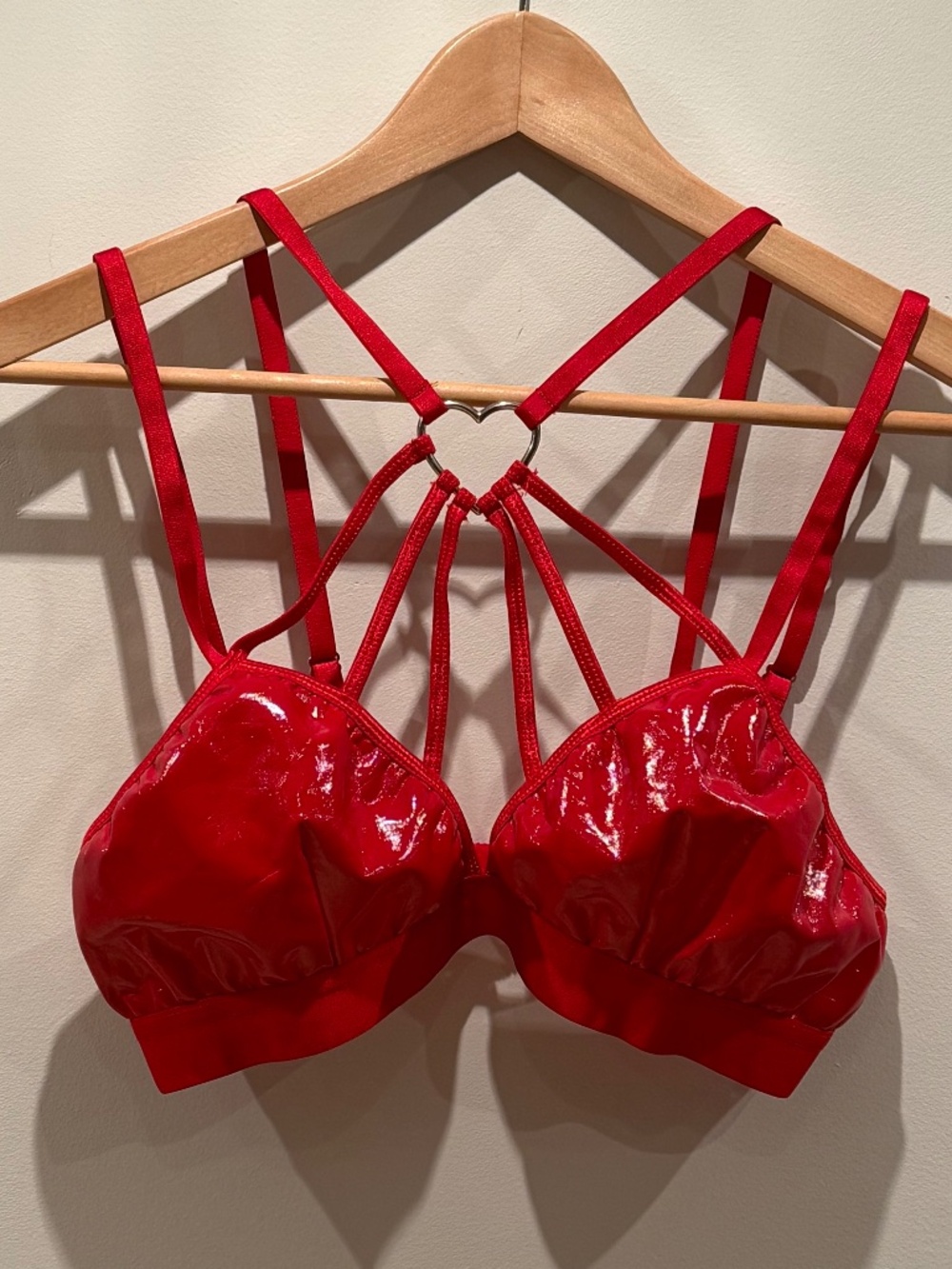 Dolls Kill Sugar Thrillz red pleather strappy bra with silver heart, size M